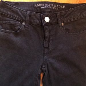 Black slightly distressed XLONG AE jeans